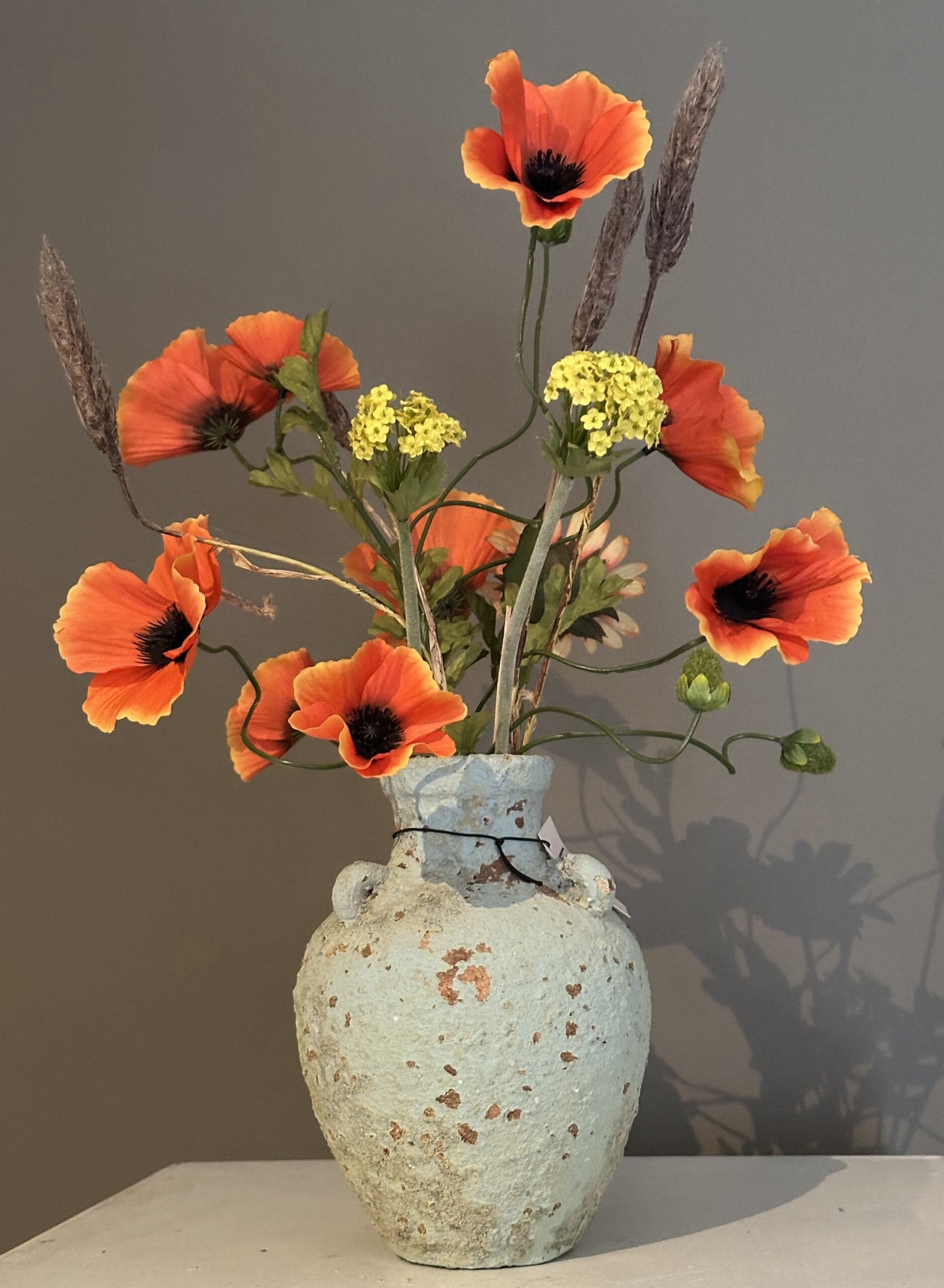 PTMD kruikje gevuld met oranje klaprozen