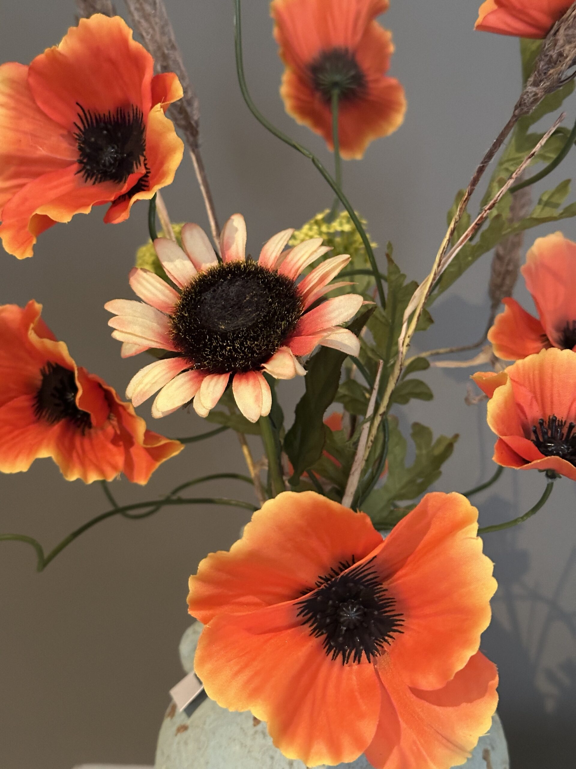 PTMD kruikje gevuld met oranje klaprozen